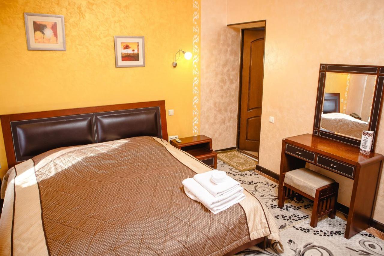 Totem Hotel Shymkent Esterno foto
